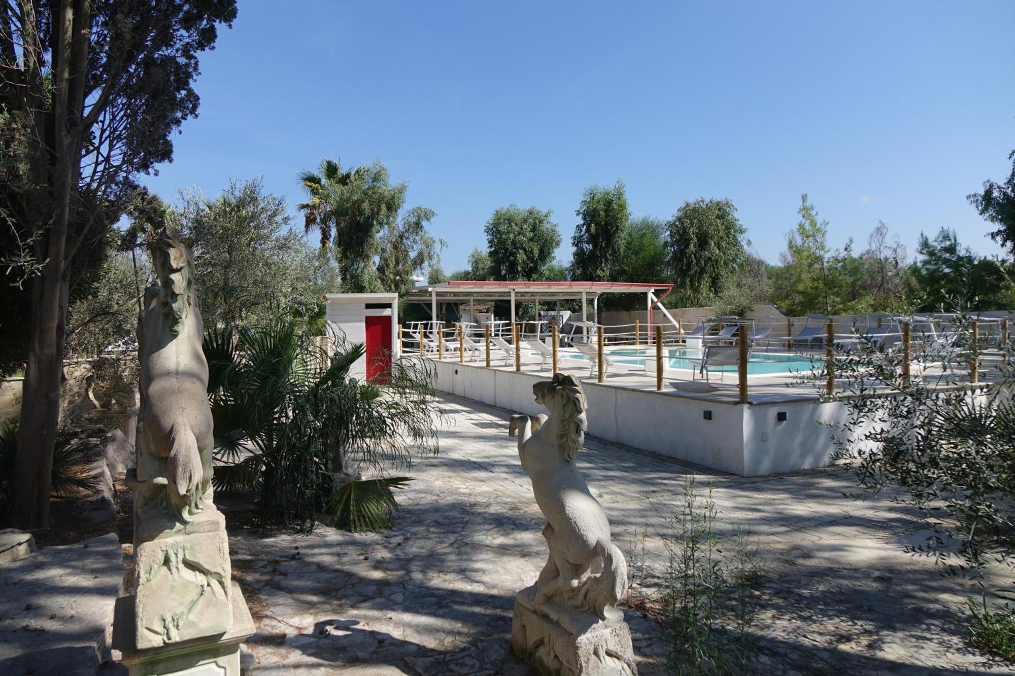 Giardini Sausari Residence Punta Prosciutto Exteriör bild